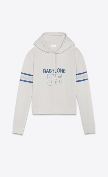 Kapuzensweatshirt aus gebrochen weißem Baumwollfleece mit abgenutzter Optik und 1971 Saint Laurent-Print